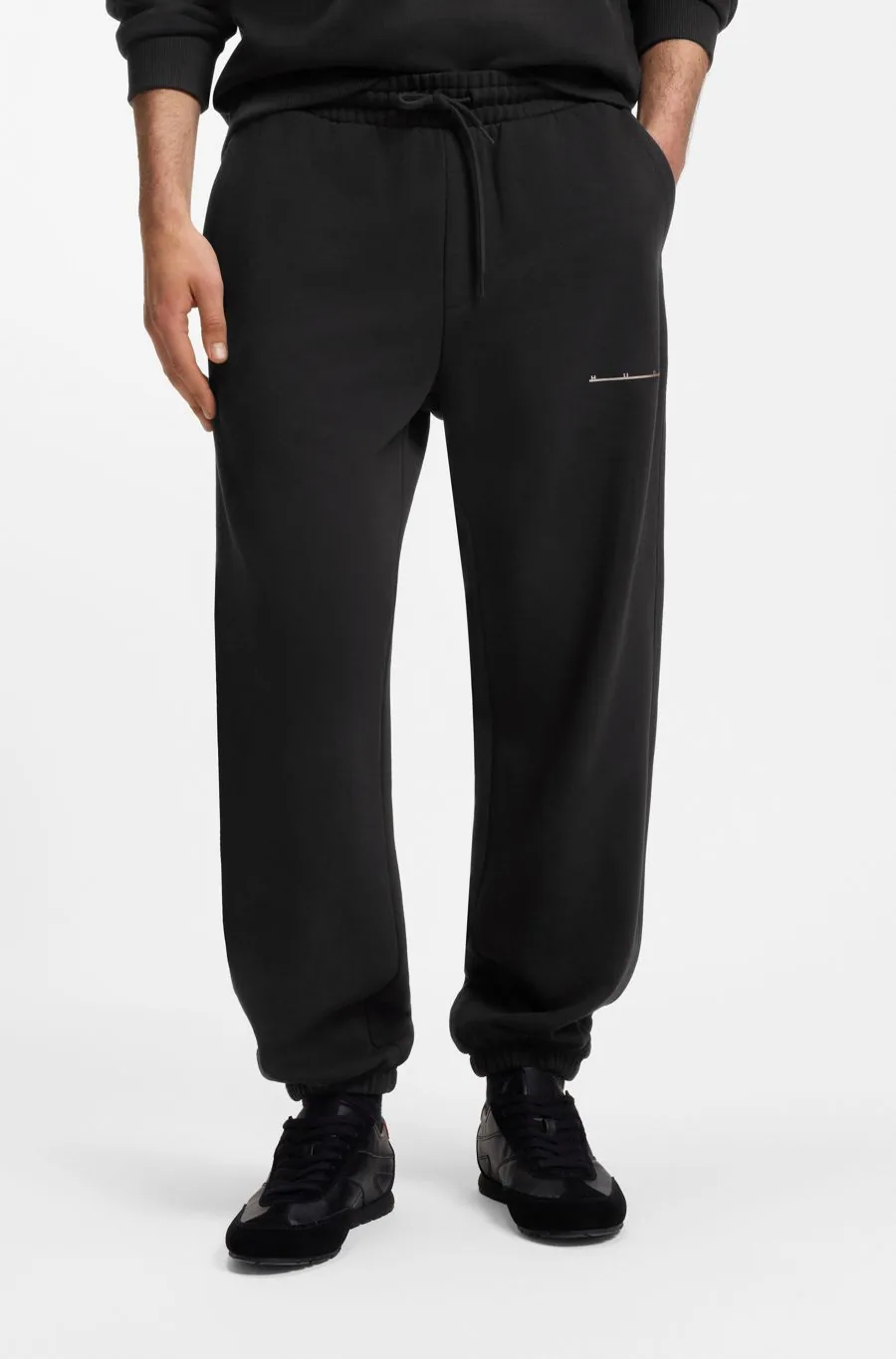 Штани Hugo Boss relaxed fit з логотипом з бавовни